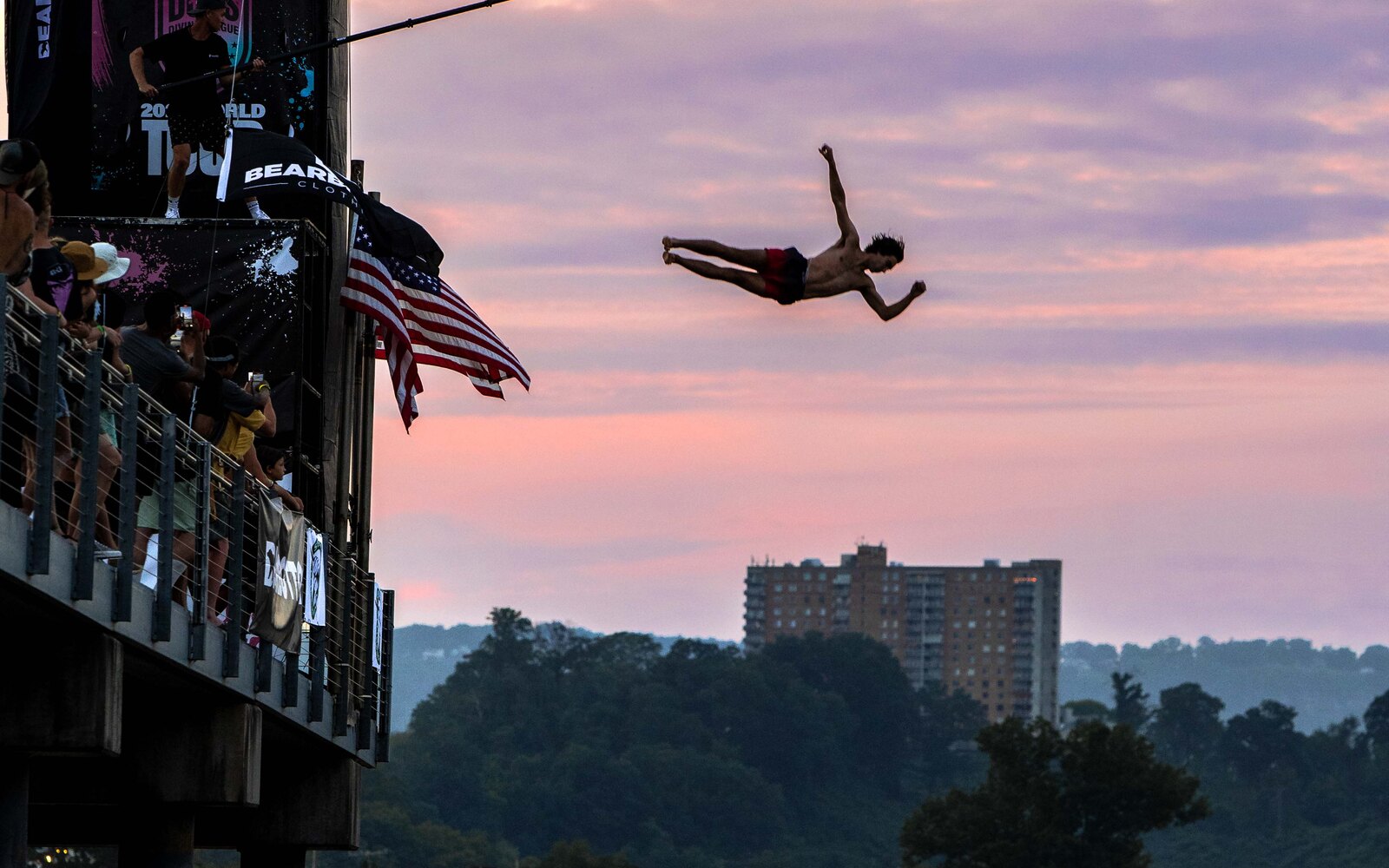 Deep-water-solo climber under the Market Street Bridge over the Tennessee River